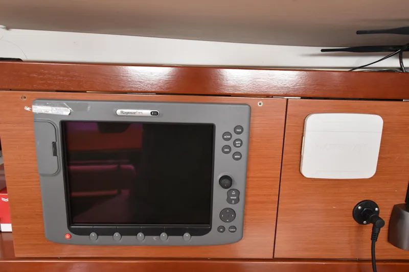 Panope Yacht Photos Pics Navigation system on a 2009 Beneteau Oceanis 54 yacht, featuring Raymarine E120 display.
