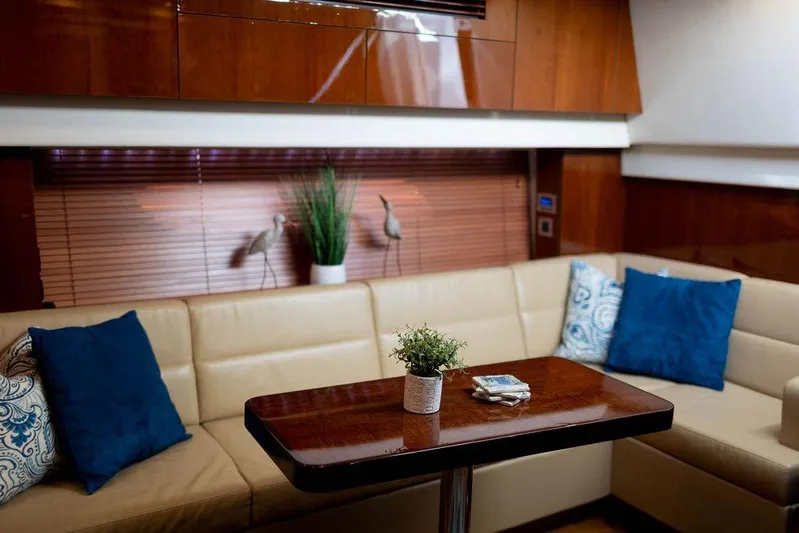 Kylie Marie Yacht Photos Pics Luxurious 2009 Searay 43 Sundancer yacht interior with elegant seating and decor.