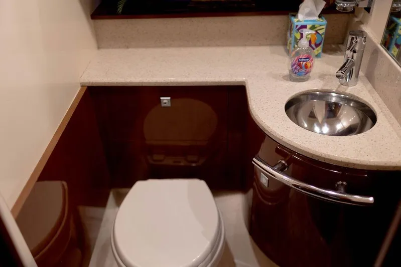 Kylie Marie Yacht Photos Pics Luxurious bathroom in 2009 Searay 43 Sundancer yacht with modern fixtures and elegant design.