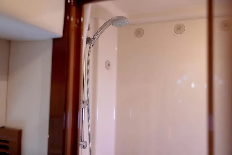 Kylie Marie Yacht Photos Pics Shower area in 2009 Searay 43 Sundancer yacht, featuring sleek design and fixtures.