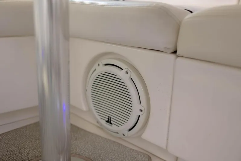 Kylie Marie Yacht Photos Pics Speaker on 2009 Searay 43 Sundancer boat interior, near cushioned seating.