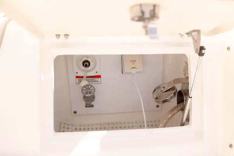 Kylie Marie Yacht Photos Pics 2009 Searay 43 Sundancer utility compartment with phone and TV connections.