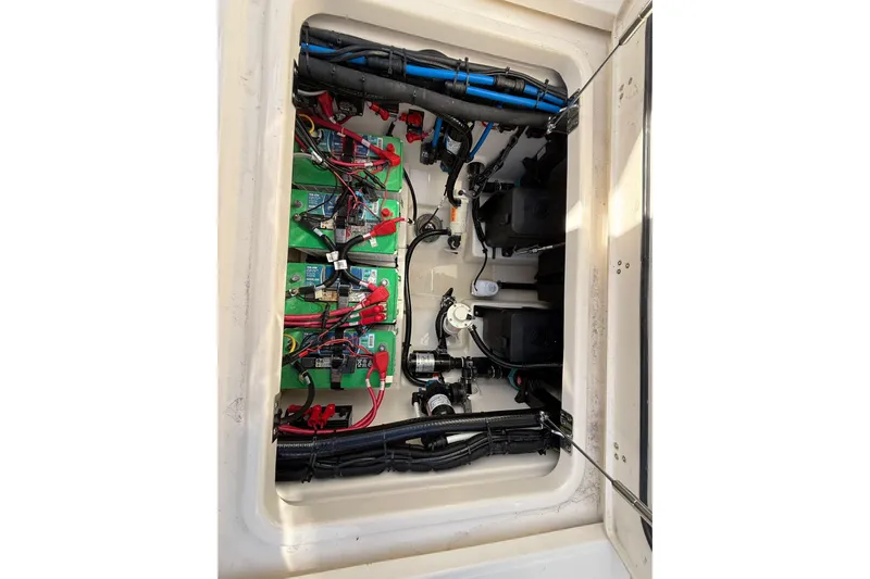  Yacht Photos Pics 2023 Boston Whaler 280 Outrage electrical compartment with wiring and components.
