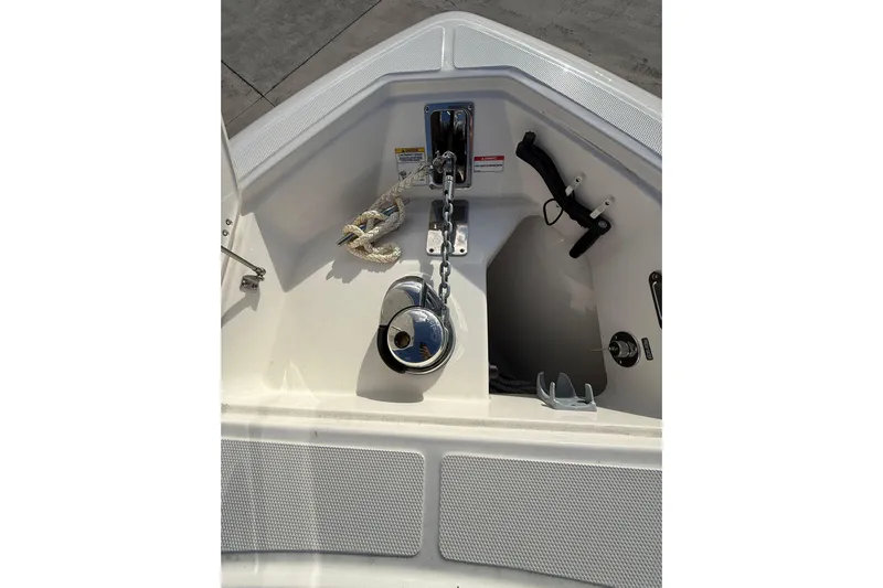  Yacht Photos Pics 2023 Boston Whaler 280 Outrage anchor system with chain and rope in bow compartment.