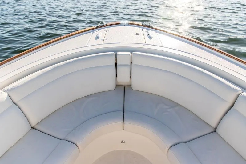 Stargazer Yacht Photos Pics 2024 Hinckley Sport Boat 40c with luxurious white seating on calm water.