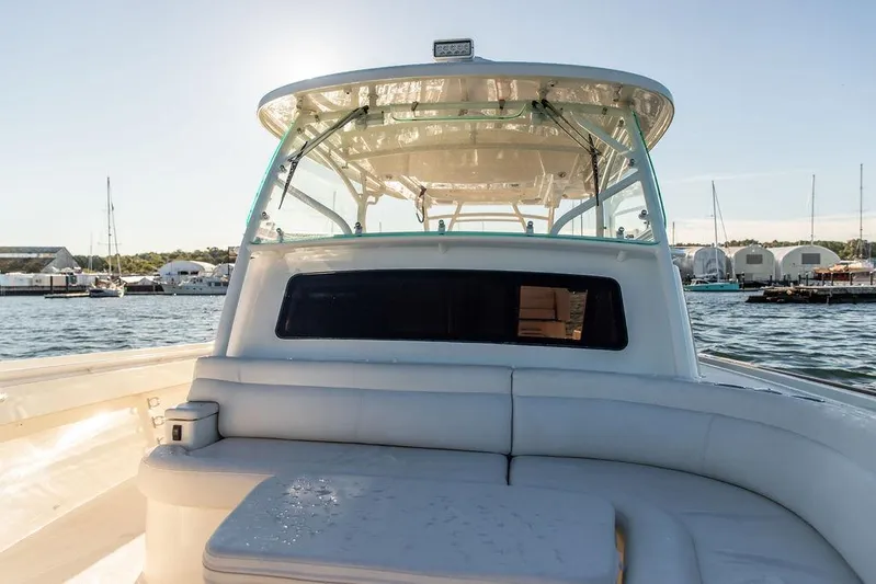 Stargazer Yacht Photos Pics 2024 Hinckley Sport Boat 40c on water, showcasing sleek design and spacious seating.