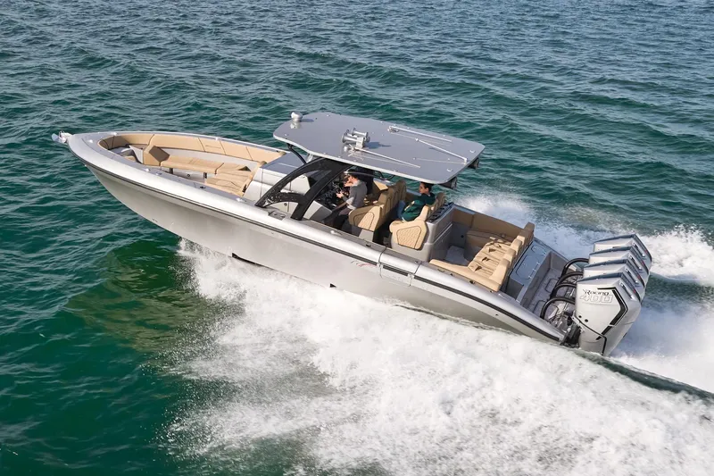  Yacht Photos Pics 2024 Midnight Express 37' Open boat cruising on the water.