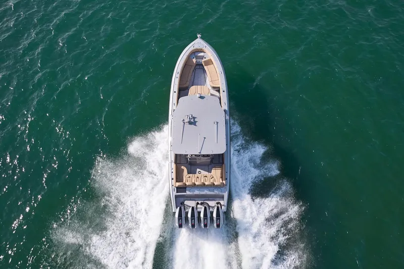  Yacht Photos Pics 2024 Midnight Express 37' Open boat cruising on the water.