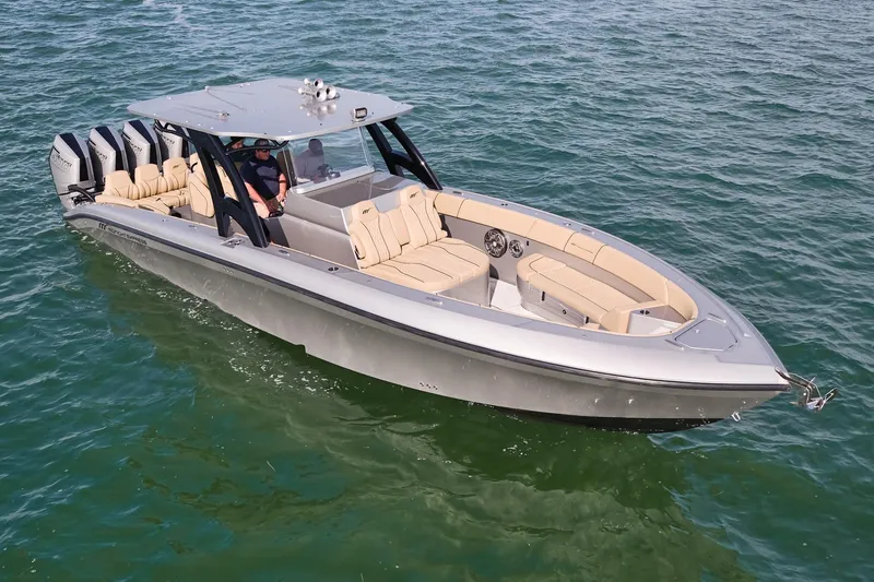  Yacht Photos Pics 2024 Midnight Express 37' Open boat cruising on water.