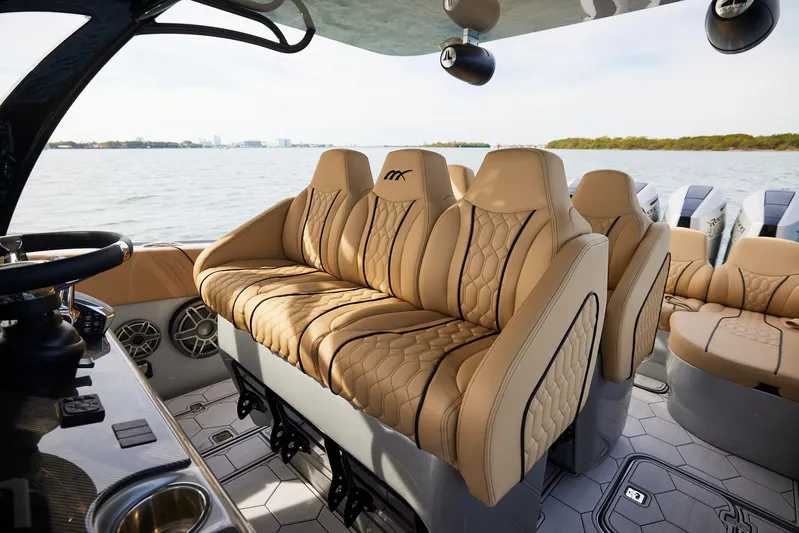 Yacht Photos Pics Luxurious seating on the 2024 Midnight Express 37' Open boat with scenic water view.