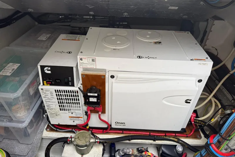 4ever VI Yacht Photos Pics Cummins Onan Marine QD generator in a 2022 Lagoon 67 yacht engine room.