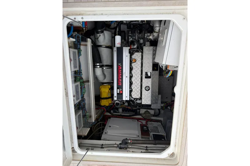 4ever VI Yacht Photos Pics Engine compartment of a 2022 Lagoon 67 yacht, featuring a Yanmar engine.