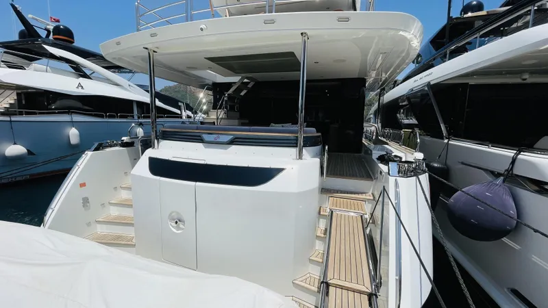  Yacht Photos Pics 2024 Sirena 78 yacht stern view with spacious deck and elegant design.