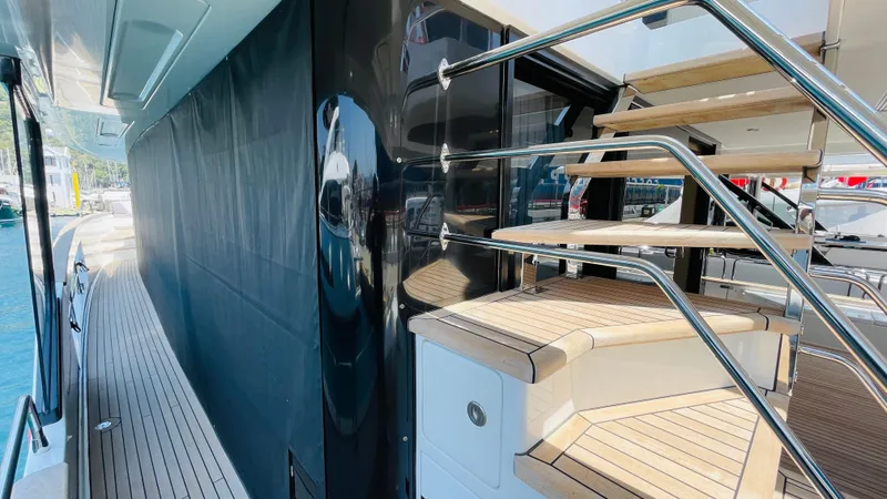  Yacht Photos Pics Luxurious 2024 Sirena 78 yacht with sleek deck and modern staircase design.