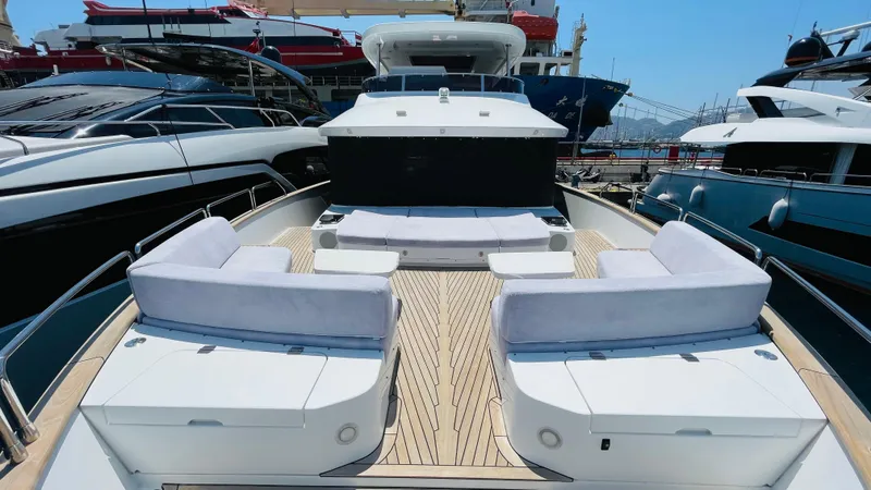  Yacht Photos Pics Luxurious 2024 Sirena 78 yacht with spacious deck and elegant seating arrangement.