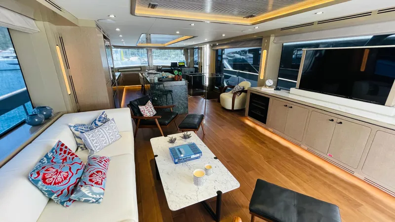  Yacht Photos Pics Luxurious interior of 2024 Sirena 78 yacht with modern furnishings and large windows.