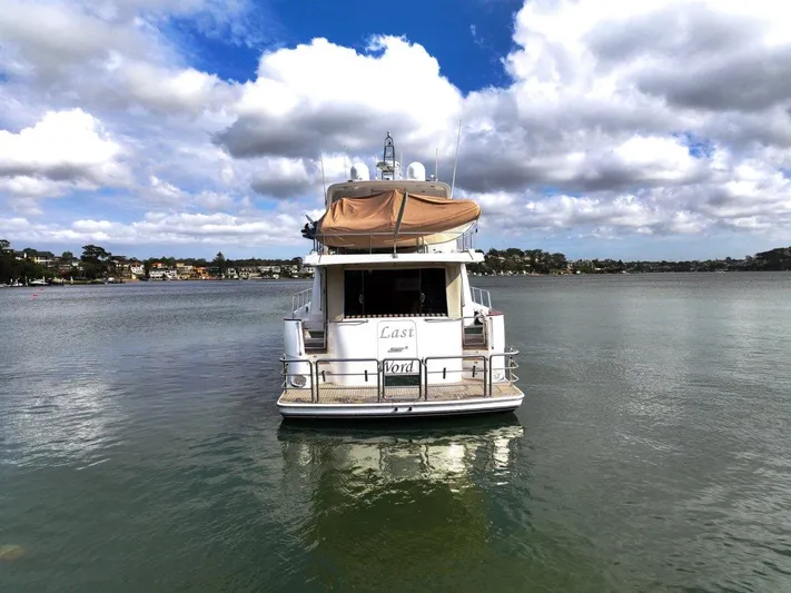 Pama 65 Pilot House Yacht Photos Pics 2011 Pama 65 Pilot House yacht on calm water under cloudy sky.