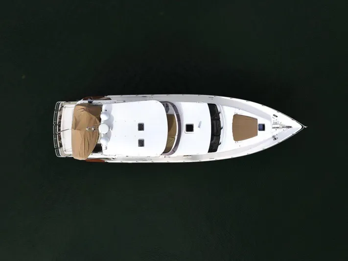 Pama 65 Pilot House Yacht Photos Pics Overhead view of 2011 Pama 65 Pilot House yacht on dark water.