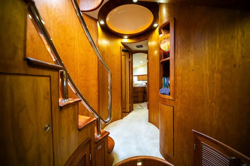 Pama 65 Pilot House Yacht Photos Pics Luxurious interior of 2011 Pama 65 Pilot House yacht with wooden finishes and elegant lighting.