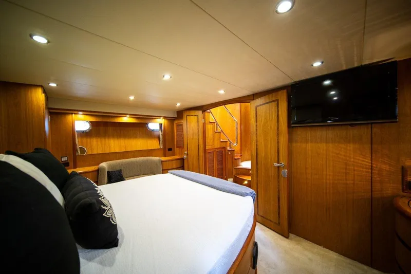 Pama 65 Pilot House Yacht Photos Pics Luxurious cabin interior of 2011 Pama 65 Pilot House yacht with modern amenities.