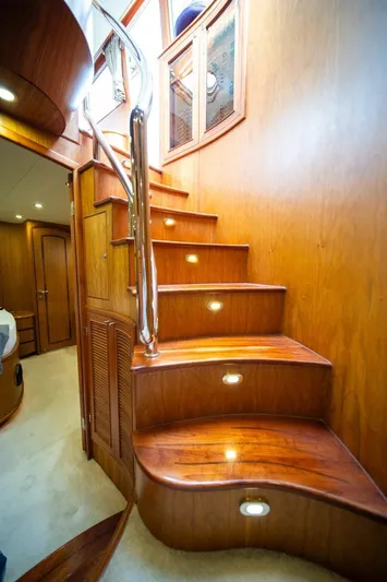 Pama 65 Pilot House Yacht Photos Pics Staircase with wooden steps and modern lighting in 2011 Pama 65 Pilot House yacht.