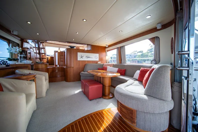 Pama 65 Pilot House Yacht Photos Pics Luxurious interior of 2011 Pama 65 Pilot House yacht with elegant seating and decor.
