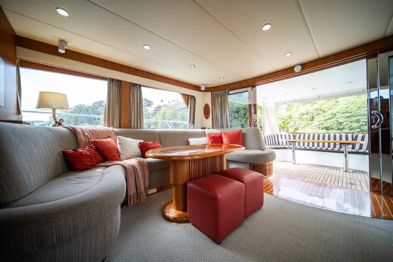 Pama 65 Pilot House Yacht Photos Pics Luxurious interior of 2011 Pama 65 Pilot House yacht with elegant seating and natural light.