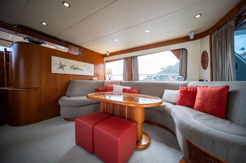 Pama 65 Pilot House Yacht Photos Pics Luxurious interior of 2011 Pama 65 Pilot House yacht with elegant seating and decor.