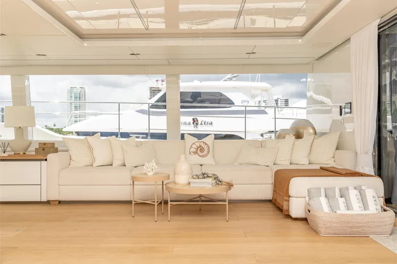 Fat Cat Yacht Photos Pics Luxurious interior of 2024 Sunreef 80 Power Cat yacht with elegant seating and decor.