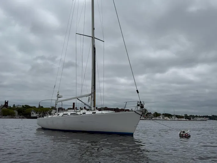 Wasabi Pea Yacht Photos Pics 2003 J Boats J/46 sailboat anchored on a cloudy day.