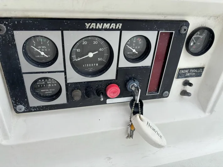 Wasabi Pea Yacht Photos Pics Control panel of a 2003 J Boats J/46 with Yanmar engine gauges and key.