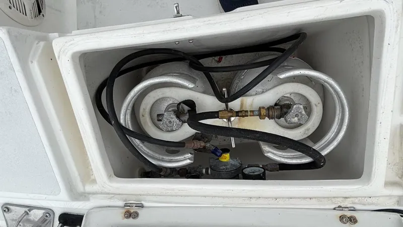 Wasabi Pea Yacht Photos Pics Propane tank storage compartment on a 2003 J Boats J/46 sailboat.