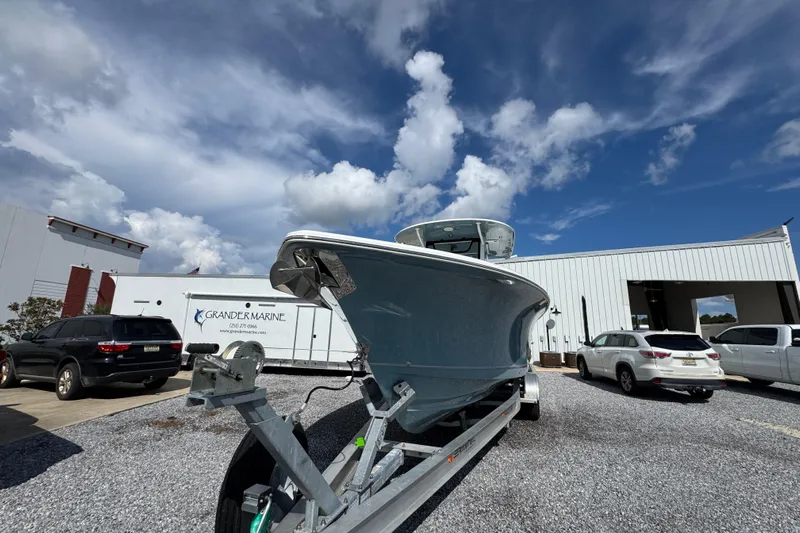  Yacht Photos Pics 2023 Sea Hunt Gamefish 30 Coffin Box boat on trailer, dealership background.