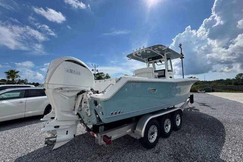  Yacht Photos Pics 2023 Sea Hunt Gamefish 30 Coffin Box boat with Yamaha engine on trailer.