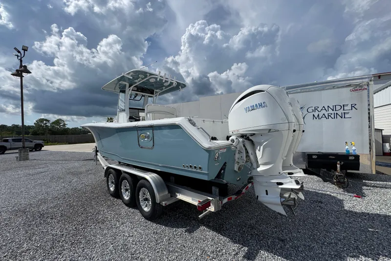  Yacht Photos Pics 2023 Sea Hunt Gamefish 30 Coffin Box boat with dual Yamaha engines on a trailer.