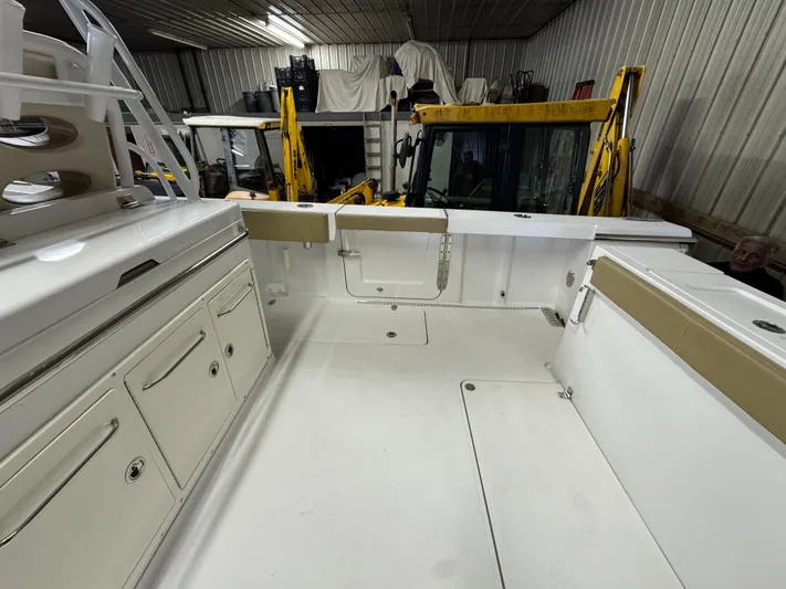  Yacht Photos Pics 2017 Southport 33 FE boat interior in storage, featuring spacious deck and cabinetry.