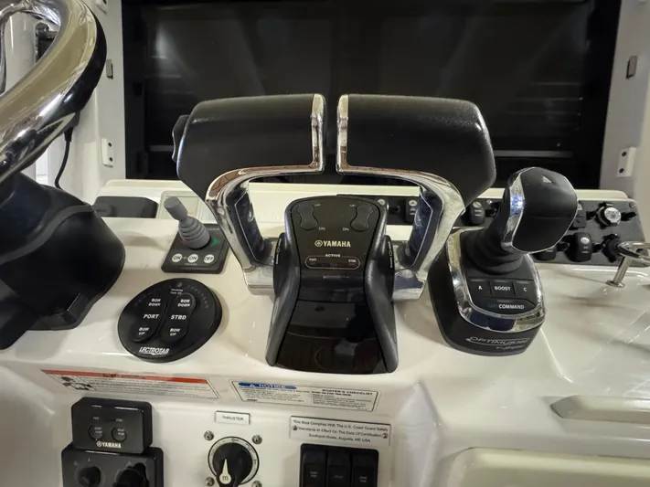  Yacht Photos Pics Control panel of a 2017 Southport 33 FE boat with Yamaha throttle and joystick.