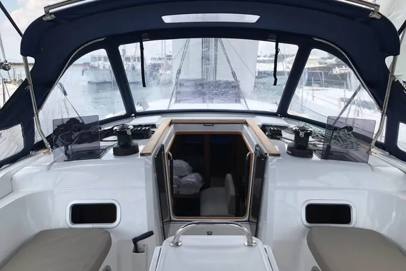 Albinez Yacht Photos Pics 2018 Jeanneau Sun Odyssey 479 cockpit with navigation equipment and seating.