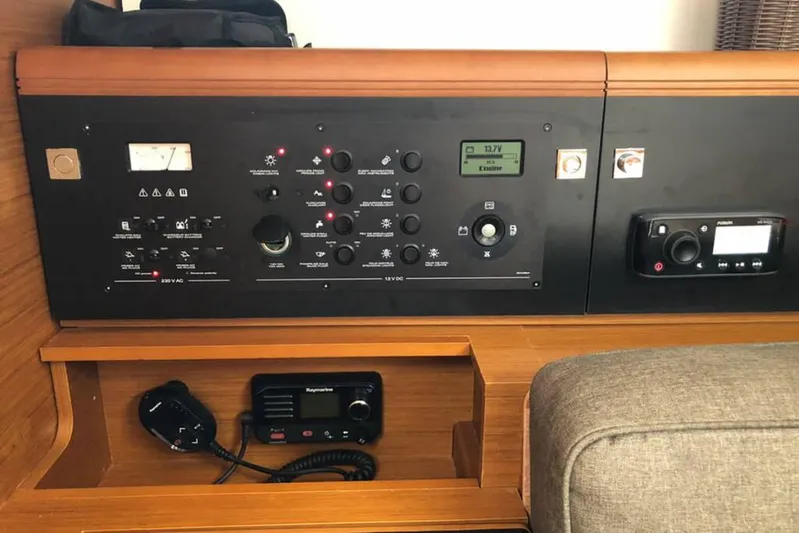 Albinez Yacht Photos Pics Control panel of 2018 Jeanneau Sun Odyssey 479 yacht with navigation and communication equipment.