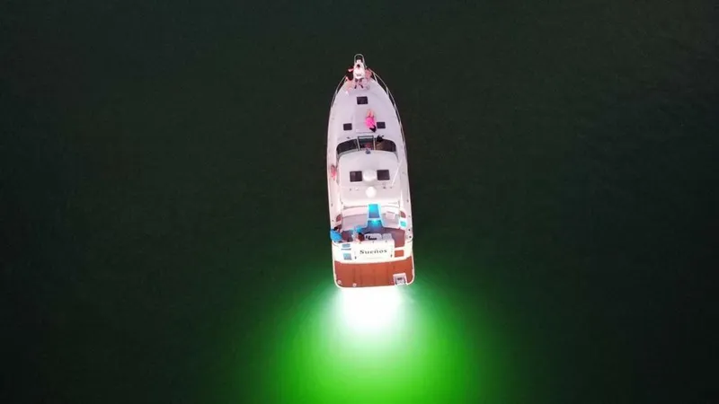 Suenos Yacht Photos Pics Aerial view of 2005 Tiara Yachts 3600 Sovran with underwater lights.