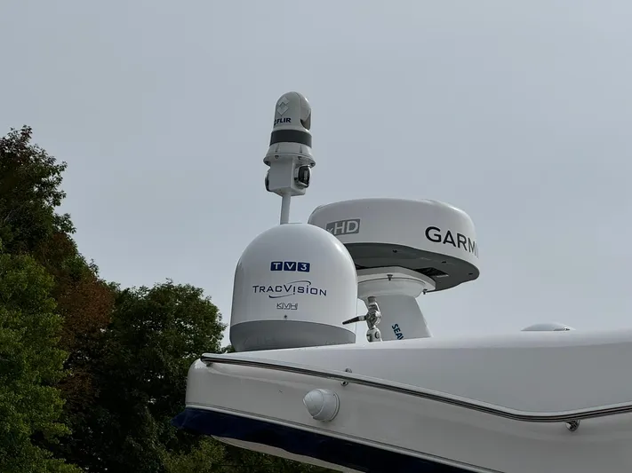 No Regrets Yacht Photos Pics 2020 Regal 38 Grande Coupe with Garmin and TracVision equipment on top.