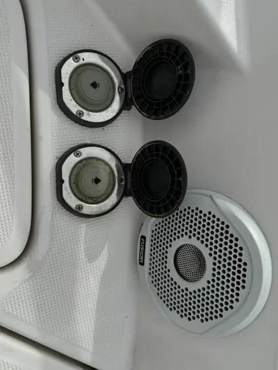 No Regrets Yacht Photos Pics 2020 Regal 38 Grande Coupe boat speakers and power outlets on white interior.