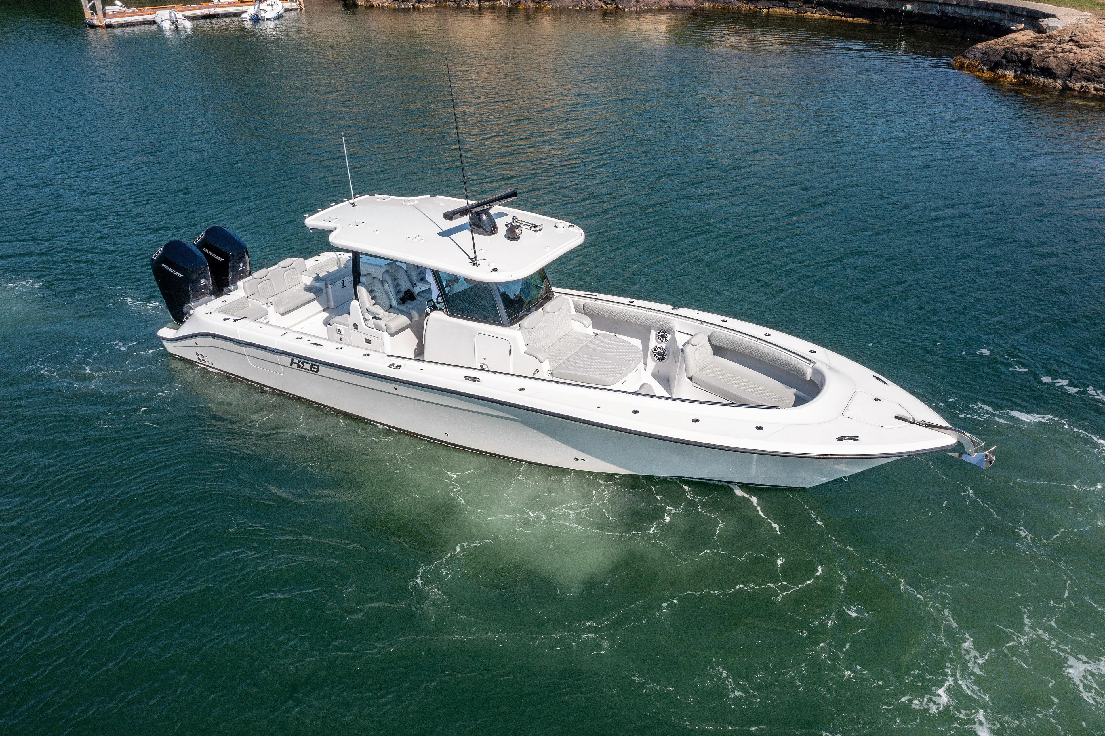  Yacht Photos Pics 2024 HCB 39 Speciale boat cruising on clear water.