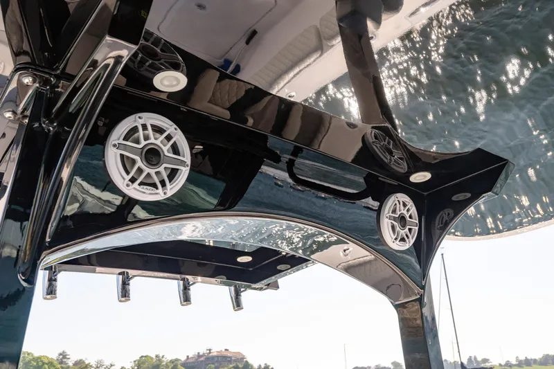  Yacht Photos Pics 2024 HCB 39 Speciale boat with sleek black design and built-in speakers.