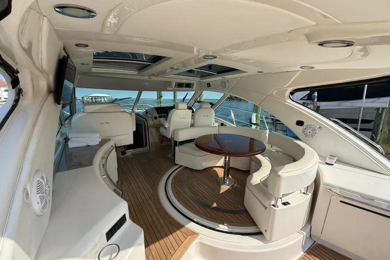 Positive Vibes Yacht Photos Pics Luxurious 2008 Sea Ray 550 Sundancer yacht interior with elegant seating and wooden flooring.