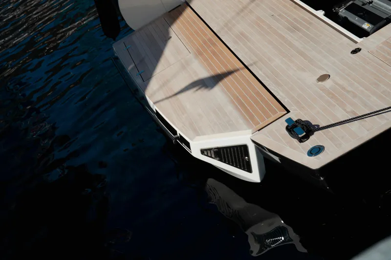  Yacht Photos Pics Sleek Anvera 48 yacht deck, 2026 model, docked on calm water.