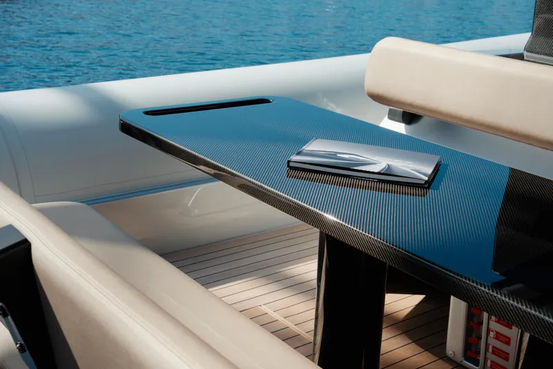  Yacht Photos Pics Luxurious Anvera 48 yacht interior with sleek carbon fiber table, 2026 model.