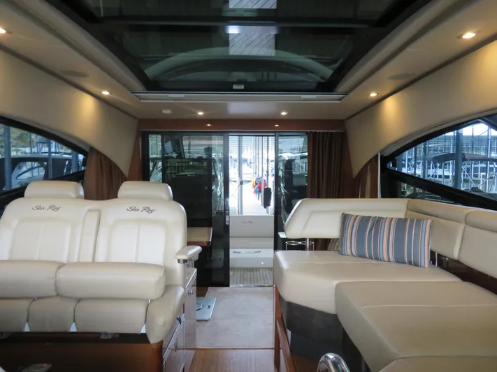 Sea-f-o Yacht Photos Pics Interior of 2015 Sea Ray 470 Sundancer yacht with luxurious seating and panoramic windows.