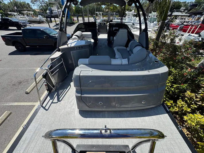  Yacht Photos Pics 2025 Avalon Excalibur 27' pontoon boat with sleek seating and modern design.