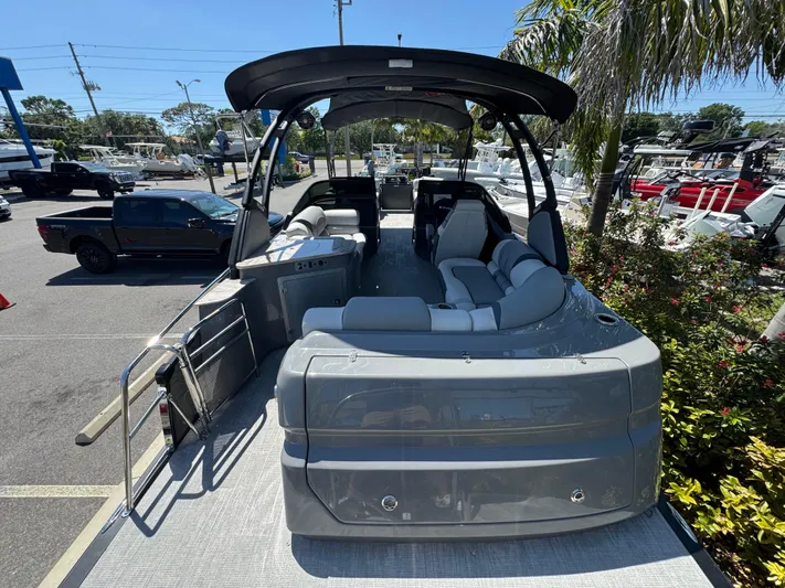  Yacht Photos Pics 2025 Avalon Excalibur 27' boat with sleek design, spacious seating, and modern features.